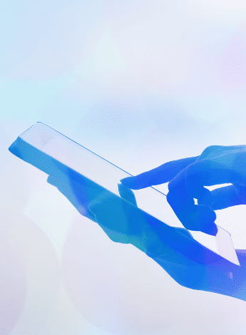 The image shows the silhouette of a hand pointing to something on a tablet device.